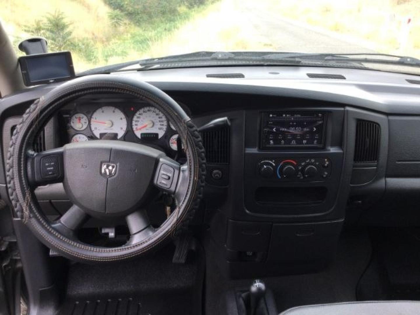 2005 Mineral Gray Metallic Clearcoat /Dark Slate Gray Dodge Ram 2500 SLT Quad Cab (3D7KS28C25G) with an Cummins 5.9L I-6 diesel direct injection engine, 4 speed automatic transmission, located at 1801 Main Street, Lewiston, 83501, (208) 743-9371, 46.417065, -117.004799- Photo#6