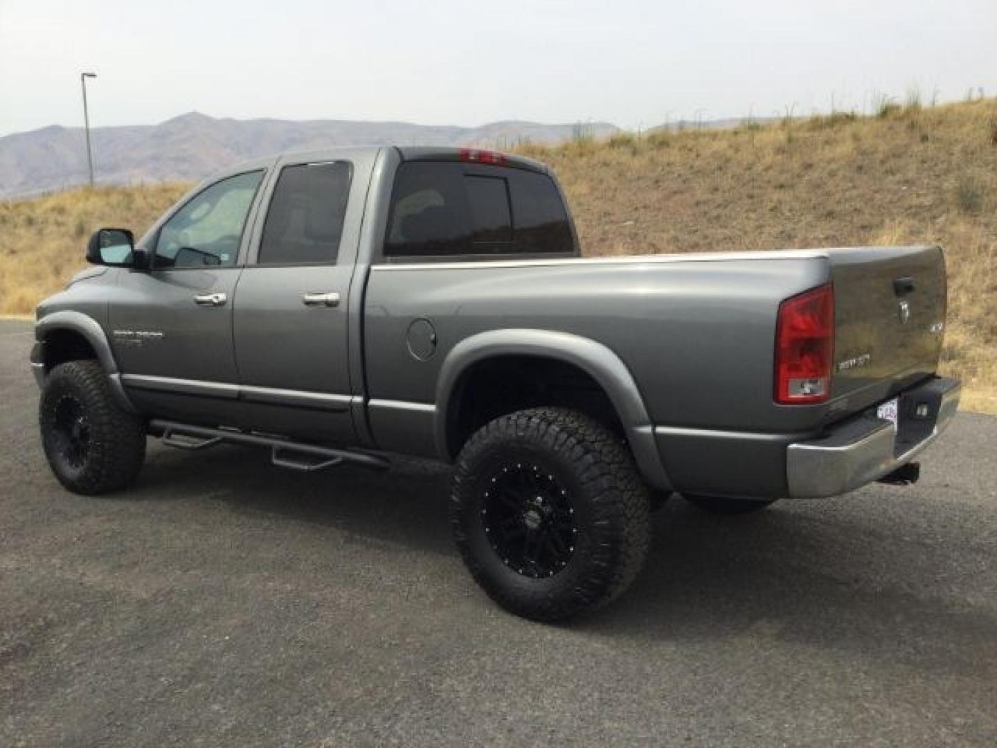 2005 Mineral Gray Metallic Clearcoat /Dark Slate Gray Dodge Ram 2500 SLT Quad Cab (3D7KS28C25G) with an Cummins 5.9L I-6 diesel direct injection engine, 4 speed automatic transmission, located at 1801 Main Street, Lewiston, 83501, (208) 743-9371, 46.417065, -117.004799- Photo#7