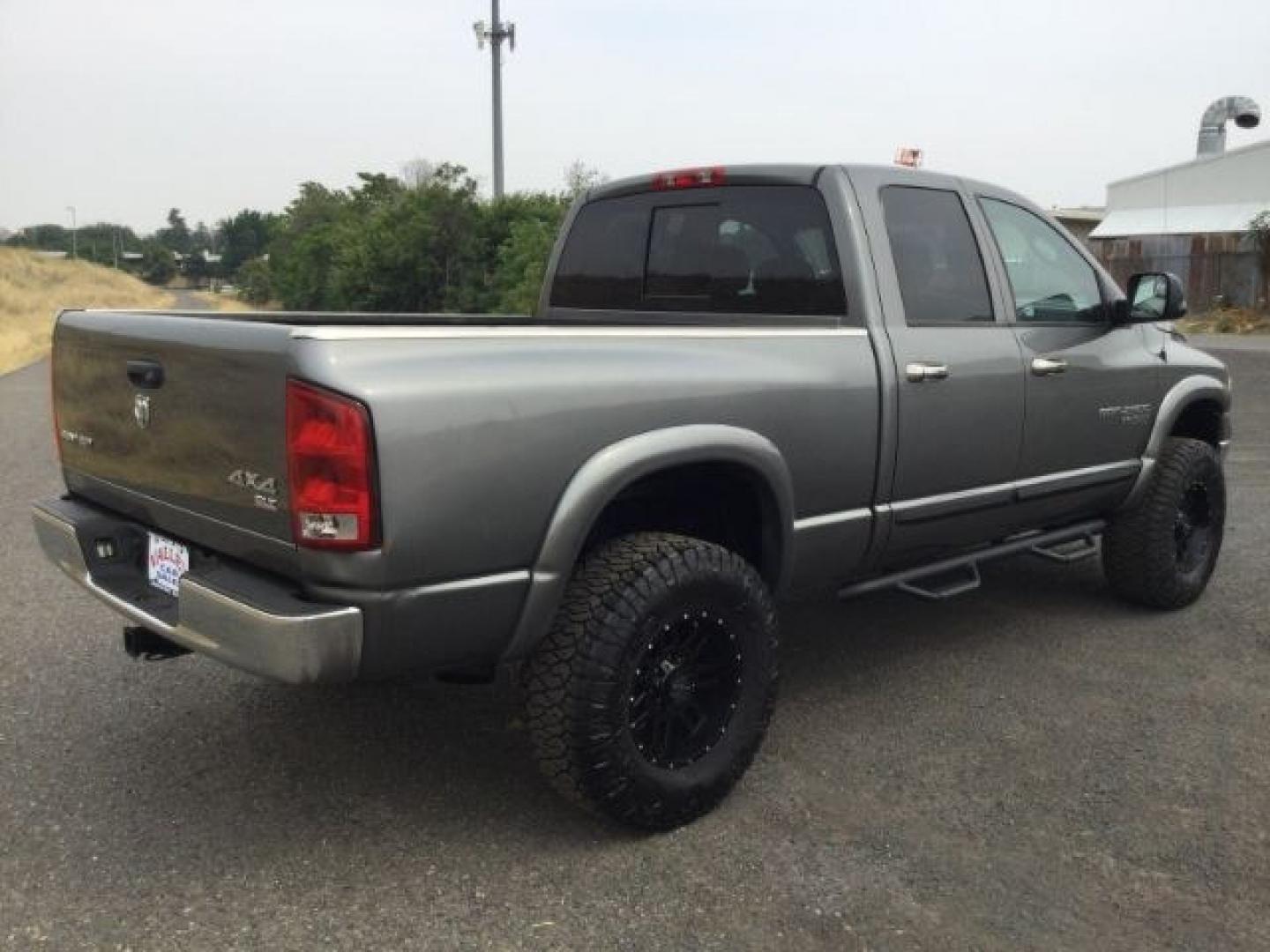 2005 Mineral Gray Metallic Clearcoat /Dark Slate Gray Dodge Ram 2500 SLT Quad Cab (3D7KS28C25G) with an Cummins 5.9L I-6 diesel direct injection engine, 4 speed automatic transmission, located at 1801 Main Street, Lewiston, 83501, (208) 743-9371, 46.417065, -117.004799- Photo#16