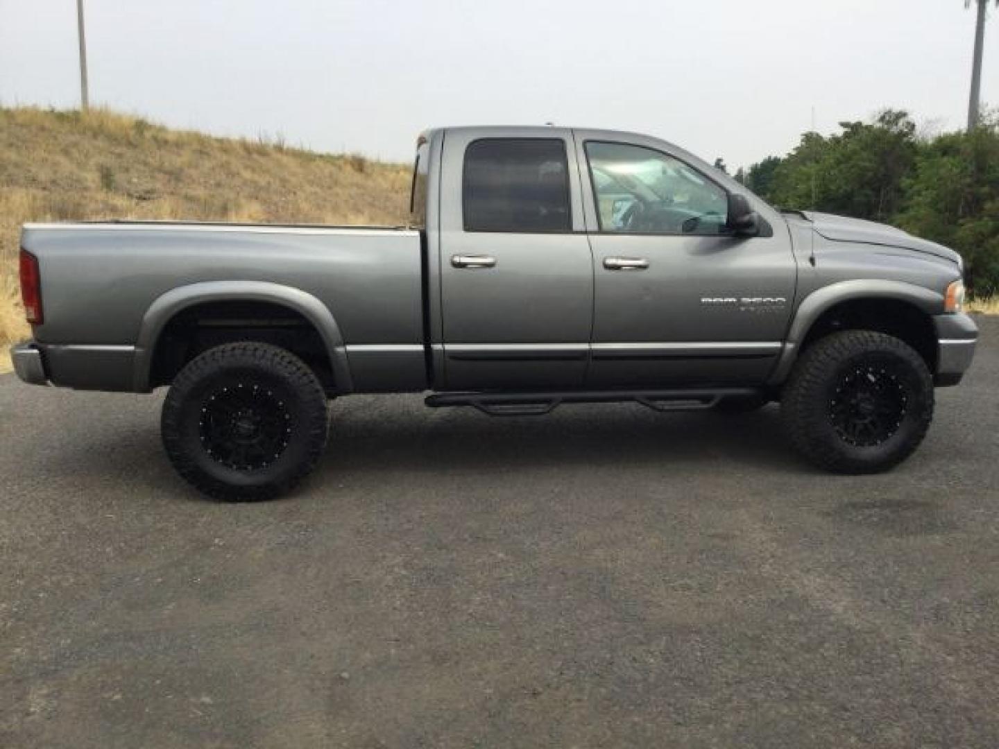 2005 Mineral Gray Metallic Clearcoat /Dark Slate Gray Dodge Ram 2500 SLT Quad Cab (3D7KS28C25G) with an Cummins 5.9L I-6 diesel direct injection engine, 4 speed automatic transmission, located at 1801 Main Street, Lewiston, 83501, (208) 743-9371, 46.417065, -117.004799- Photo#17