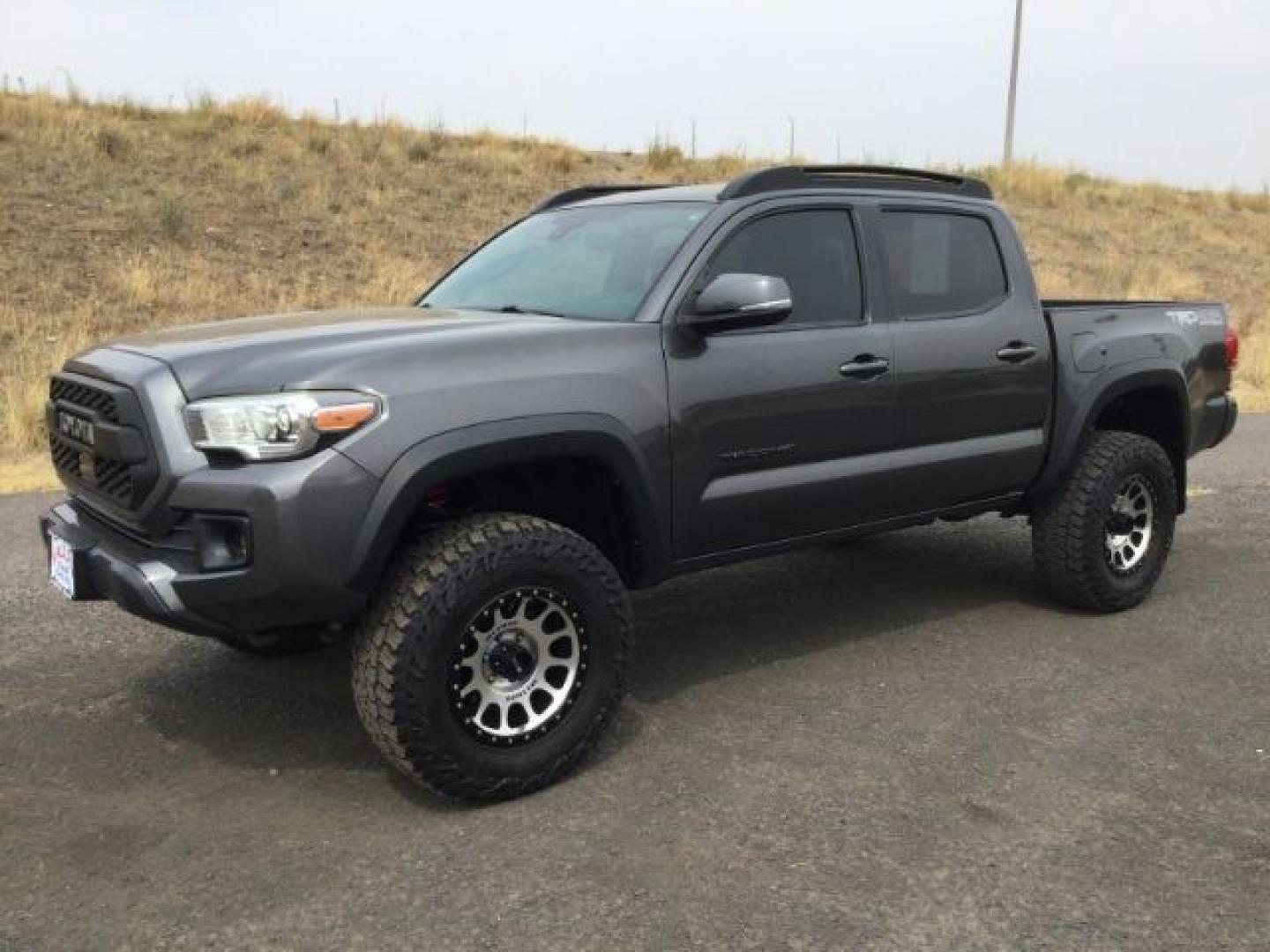 2018 Magnetic Gray Metallic Toyota Tacoma TRD Off Road (3TMCZ5AN5JM) with an 3.5L V-6 port/direct injection engine, located at 1801 Main Street, Lewiston, 83501, (208) 743-9371, 46.417065, -117.004799- Photo#1