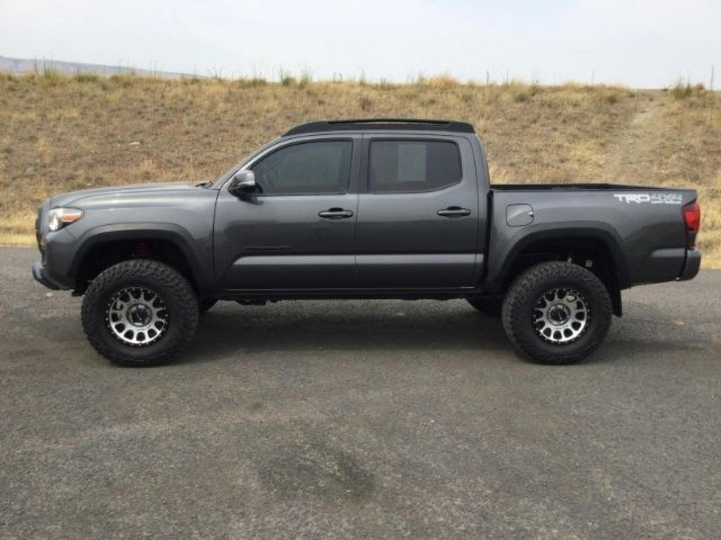 2018 Magnetic Gray Metallic Toyota Tacoma TRD Off Road (3TMCZ5AN5JM) with an 3.5L V-6 port/direct injection engine, located at 1801 Main Street, Lewiston, 83501, (208) 743-9371, 46.417065, -117.004799- Photo#7