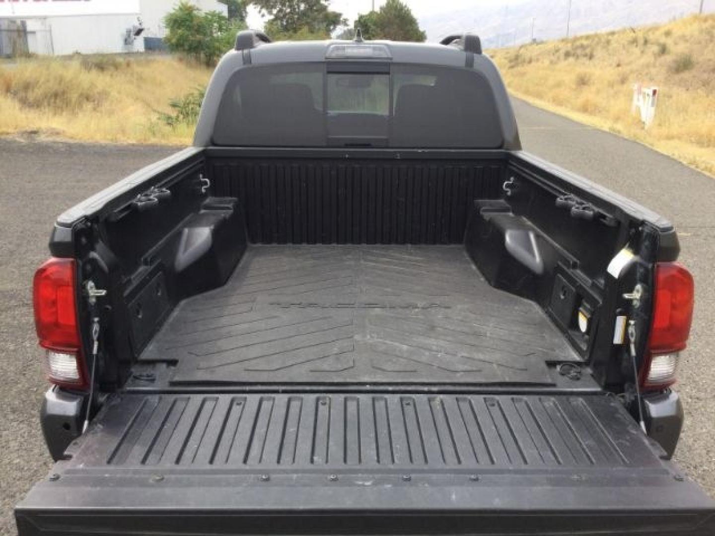 2018 Magnetic Gray Metallic Toyota Tacoma TRD Off Road (3TMCZ5AN5JM) with an 3.5L V-6 port/direct injection engine, located at 1801 Main Street, Lewiston, 83501, (208) 743-9371, 46.417065, -117.004799- Photo#10