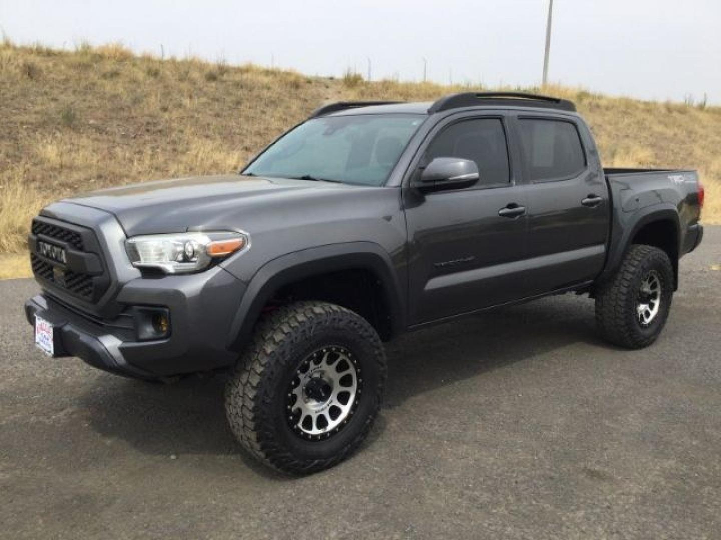 2018 Magnetic Gray Metallic Toyota Tacoma TRD Off Road (3TMCZ5AN5JM) with an 3.5L V-6 port/direct injection engine, located at 1801 Main Street, Lewiston, 83501, (208) 743-9371, 46.417065, -117.004799- Photo#18