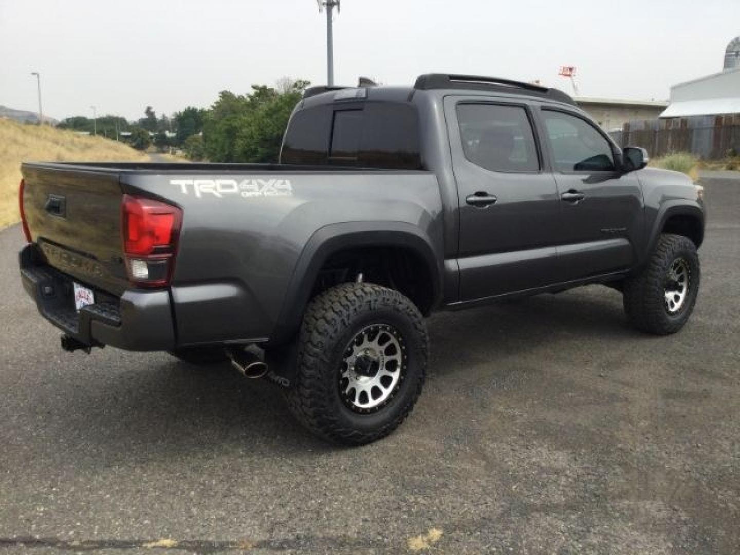 2018 Magnetic Gray Metallic Toyota Tacoma TRD Off Road (3TMCZ5AN5JM) with an 3.5L V-6 port/direct injection engine, located at 1801 Main Street, Lewiston, 83501, (208) 743-9371, 46.417065, -117.004799- Photo#21