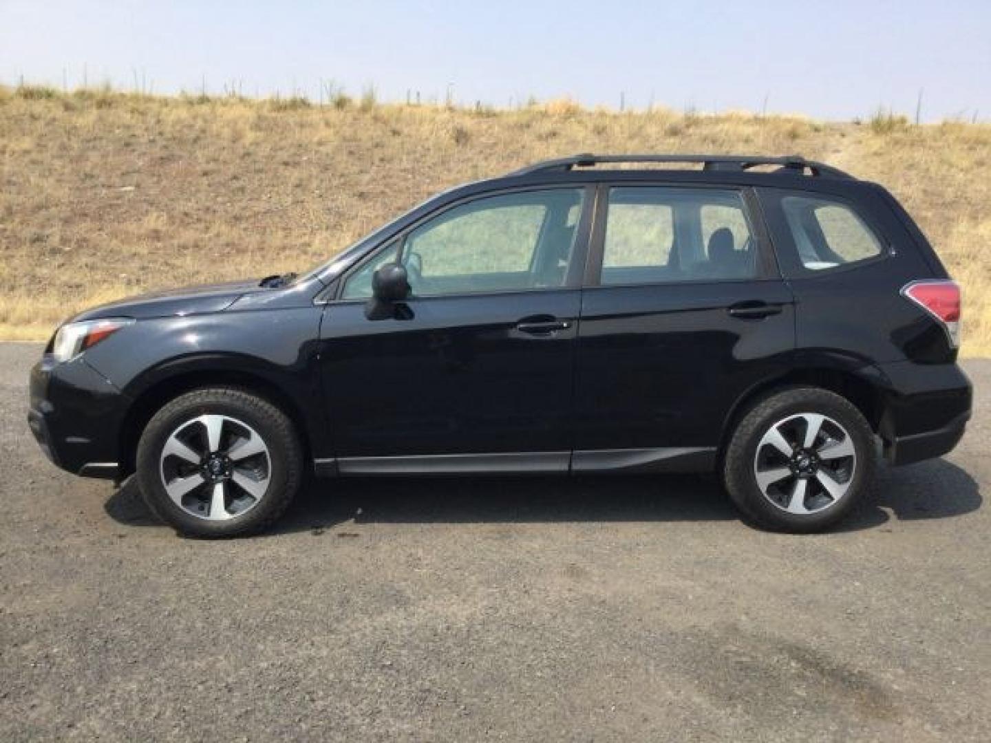 2018 Crystal Black Silica /Black Subaru Forester 2.5i (JF2SJABC3JH) with an 2.5L H-4 DOHC engine, CVT Automatic transmission, located at 1801 Main Street, Lewiston, 83501, (208) 743-9371, 46.417065, -117.004799- Photo#3