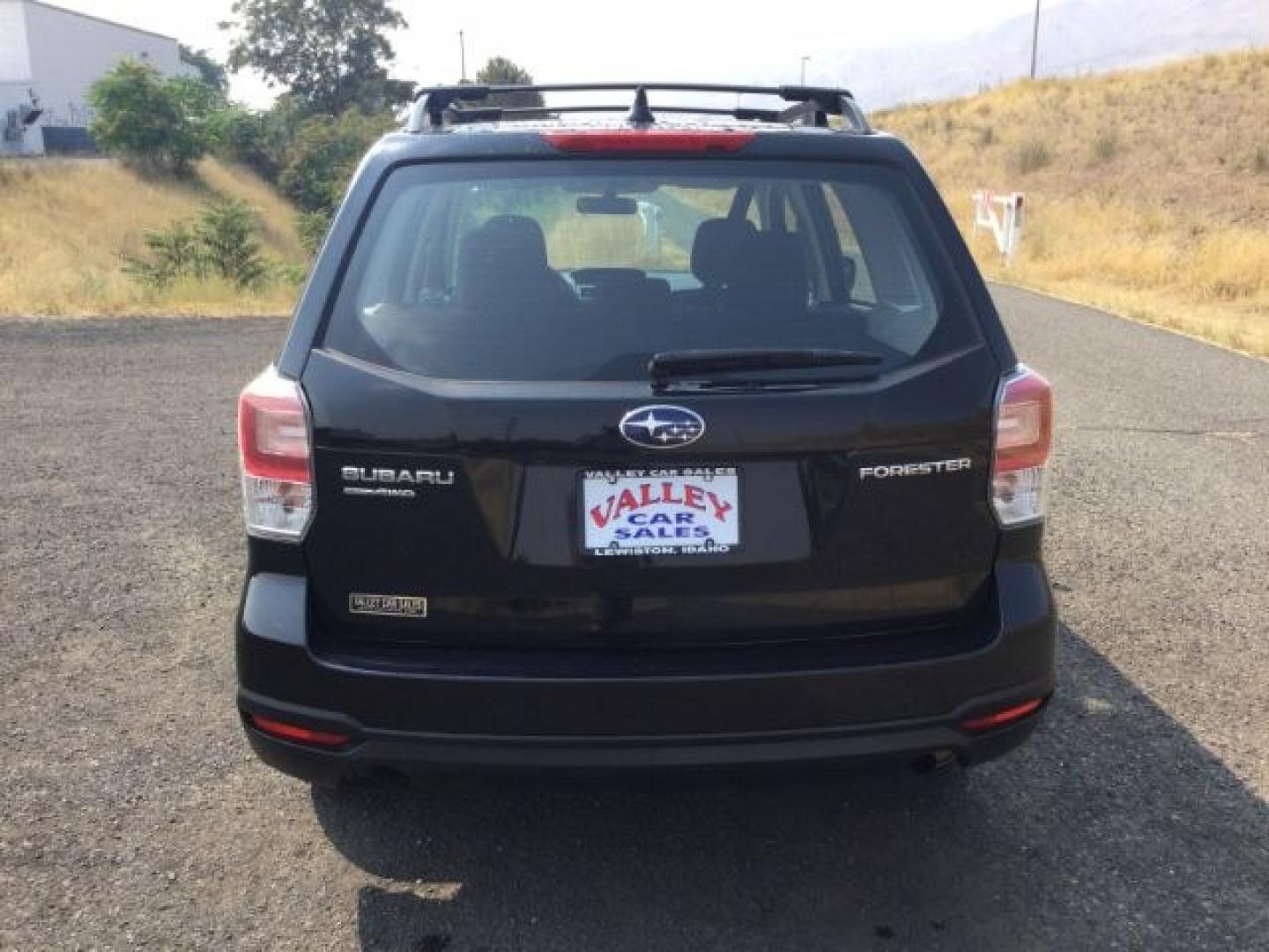 2018 Crystal Black Silica /Black Subaru Forester 2.5i (JF2SJABC3JH) with an 2.5L H-4 DOHC engine, CVT Automatic transmission, located at 1801 Main Street, Lewiston, 83501, (208) 743-9371, 46.417065, -117.004799- Photo#5