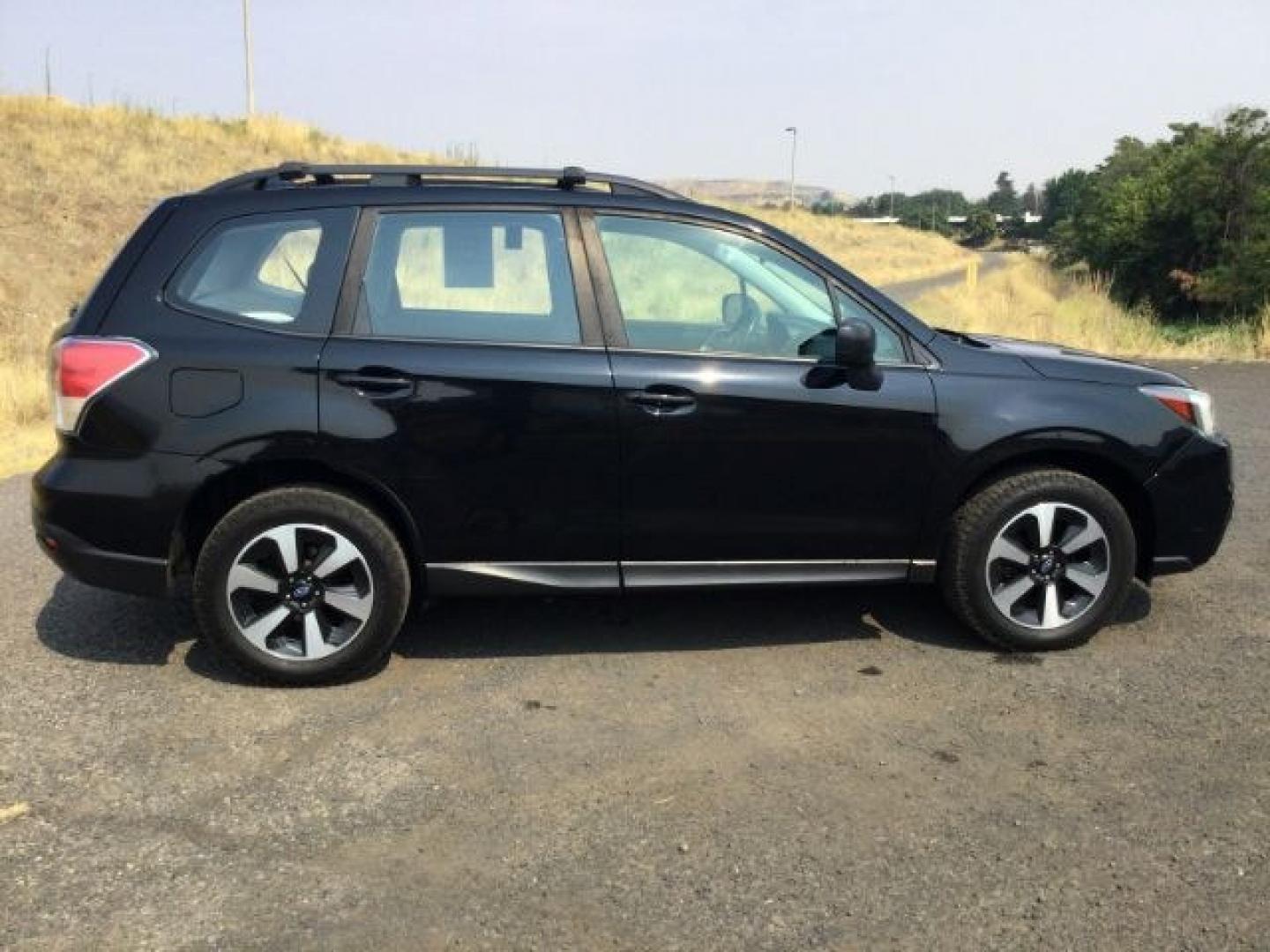 2018 Crystal Black Silica /Black Subaru Forester 2.5i (JF2SJABC3JH) with an 2.5L H-4 DOHC engine, CVT Automatic transmission, located at 1801 Main Street, Lewiston, 83501, (208) 743-9371, 46.417065, -117.004799- Photo#17