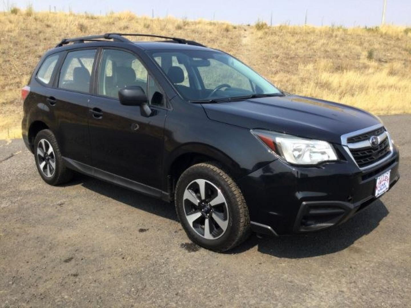 2018 Crystal Black Silica /Black Subaru Forester 2.5i (JF2SJABC3JH) with an 2.5L H-4 DOHC engine, CVT Automatic transmission, located at 1801 Main Street, Lewiston, 83501, (208) 743-9371, 46.417065, -117.004799- Photo#18