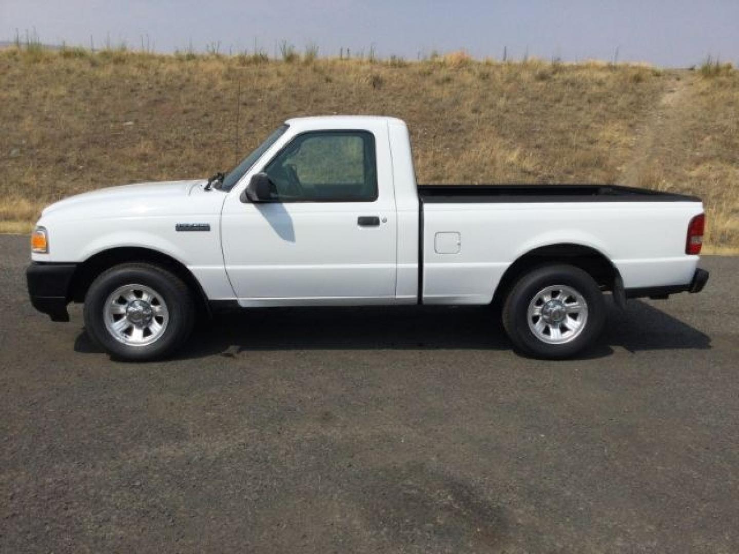 2011 Oxford White /Medium Dark Flint Ford Ranger XL Regular Cab (1FTKR1AD9BP) with an 2.3L I-4 DOHC engine, 5-Speed Manual Transmission transmission, located at 1801 Main Street, Lewiston, 83501, (208) 743-9371, 46.417065, -117.004799- Photo#3