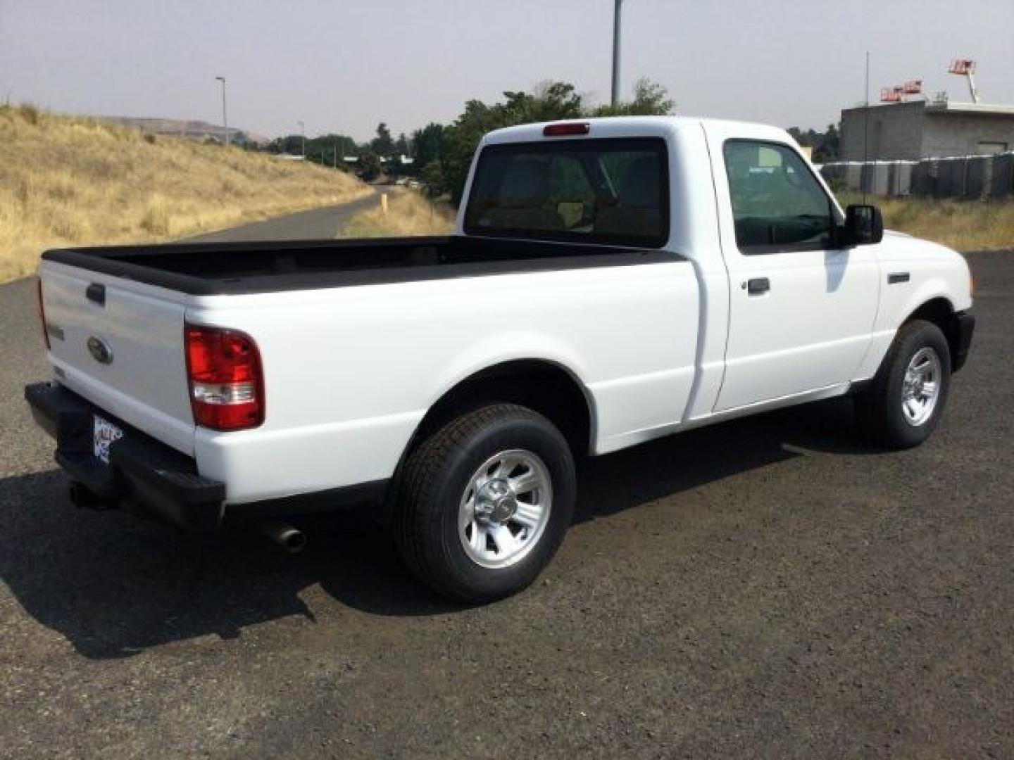 2011 Oxford White /Medium Dark Flint Ford Ranger XL Regular Cab (1FTKR1AD9BP) with an 2.3L I-4 DOHC engine, 5-Speed Manual Transmission transmission, located at 1801 Main Street, Lewiston, 83501, (208) 743-9371, 46.417065, -117.004799- Photo#12