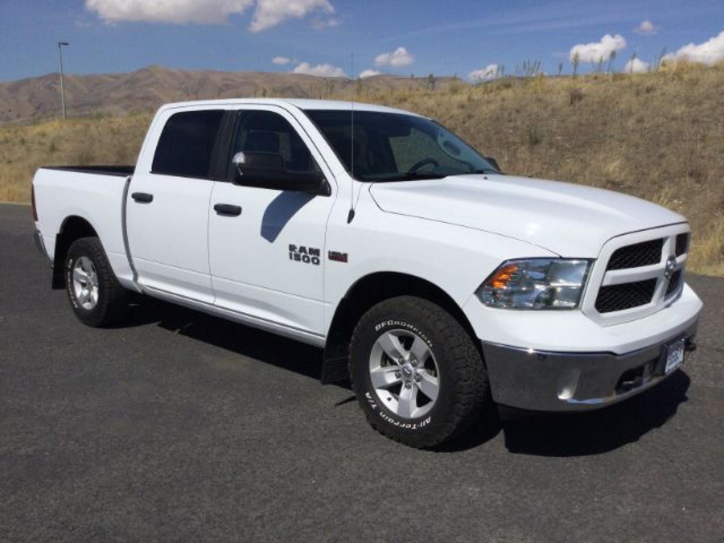 2016 Bright White /Diesel Grey/Black Ram 1500 SLT (1C6RR7LT7GS) with an HEMI 5.7L V-8 variable valve control engine, 8-Speed Automatic transmission, located at 1801 Main Street, Lewiston, 83501, (208) 743-9371, 46.417065, -117.004799- Photo#0
