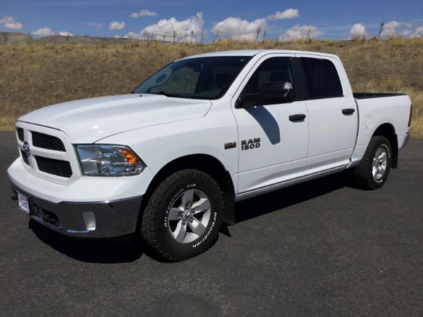 2016 Bright White /Diesel Grey/Black Ram 1500 SLT (1C6RR7LT7GS) with an HEMI 5.7L V-8 variable valve control engine, 8-Speed Automatic transmission, located at 1801 Main Street, Lewiston, 83501, (208) 743-9371, 46.417065, -117.004799- Photo#1