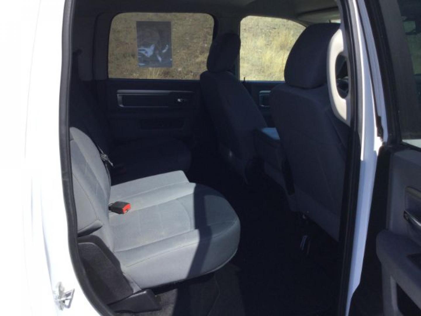 2016 Bright White /Diesel Grey/Black Ram 1500 SLT (1C6RR7LT7GS) with an HEMI 5.7L V-8 variable valve control engine, 8-Speed Automatic transmission, located at 1801 Main Street, Lewiston, 83501, (208) 743-9371, 46.417065, -117.004799- Photo#11