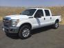 2015 Oxford White /Light Gray Leather Ford F-250 Crew Cab XLT 4x4 FX4 (1FT7W2B69FE) with an 6.2L V8 engine, 6-Speed Automatic transmission, located at 1801 Main Street, Lewiston, 83501, (208) 743-9371, 46.417065, -117.004799- Photo#1