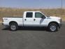 2015 Oxford White /Light Gray Leather Ford F-250 Crew Cab XLT 4x4 FX4 (1FT7W2B69FE) with an 6.2L V8 engine, 6-Speed Automatic transmission, located at 1801 Main Street, Lewiston, 83501, (208) 743-9371, 46.417065, -117.004799- Photo#2