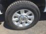 2015 Oxford White /Light Gray Leather Ford F-250 Crew Cab XLT 4x4 FX4 (1FT7W2B69FE) with an 6.2L V8 engine, 6-Speed Automatic transmission, located at 1801 Main Street, Lewiston, 83501, (208) 743-9371, 46.417065, -117.004799- Photo#9