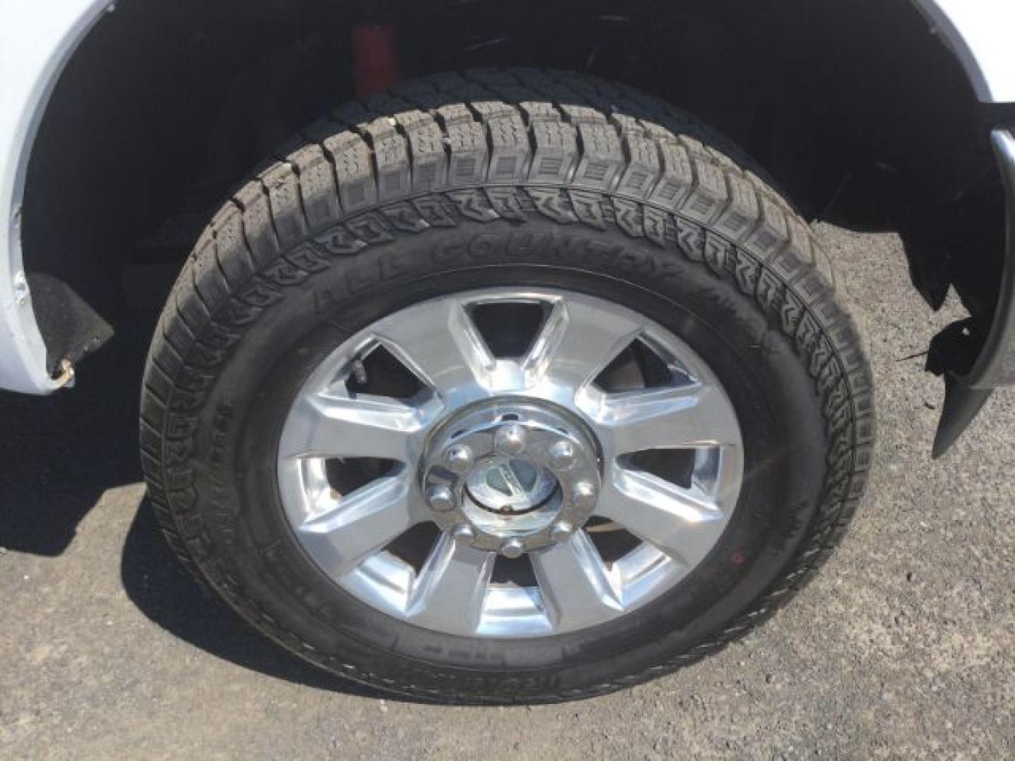 2015 Oxford White /Light Gray Leather Ford F-250 Crew Cab XLT 4x4 FX4 (1FT7W2B69FE) with an 6.2L V8 engine, 6-Speed Automatic transmission, located at 1801 Main Street, Lewiston, 83501, (208) 743-9371, 46.417065, -117.004799- Photo#12