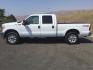 2015 Oxford White /Light Gray Leather Ford F-250 Crew Cab XLT 4x4 FX4 (1FT7W2B69FE) with an 6.2L V8 engine, 6-Speed Automatic transmission, located at 1801 Main Street, Lewiston, 83501, (208) 743-9371, 46.417065, -117.004799- Photo#17