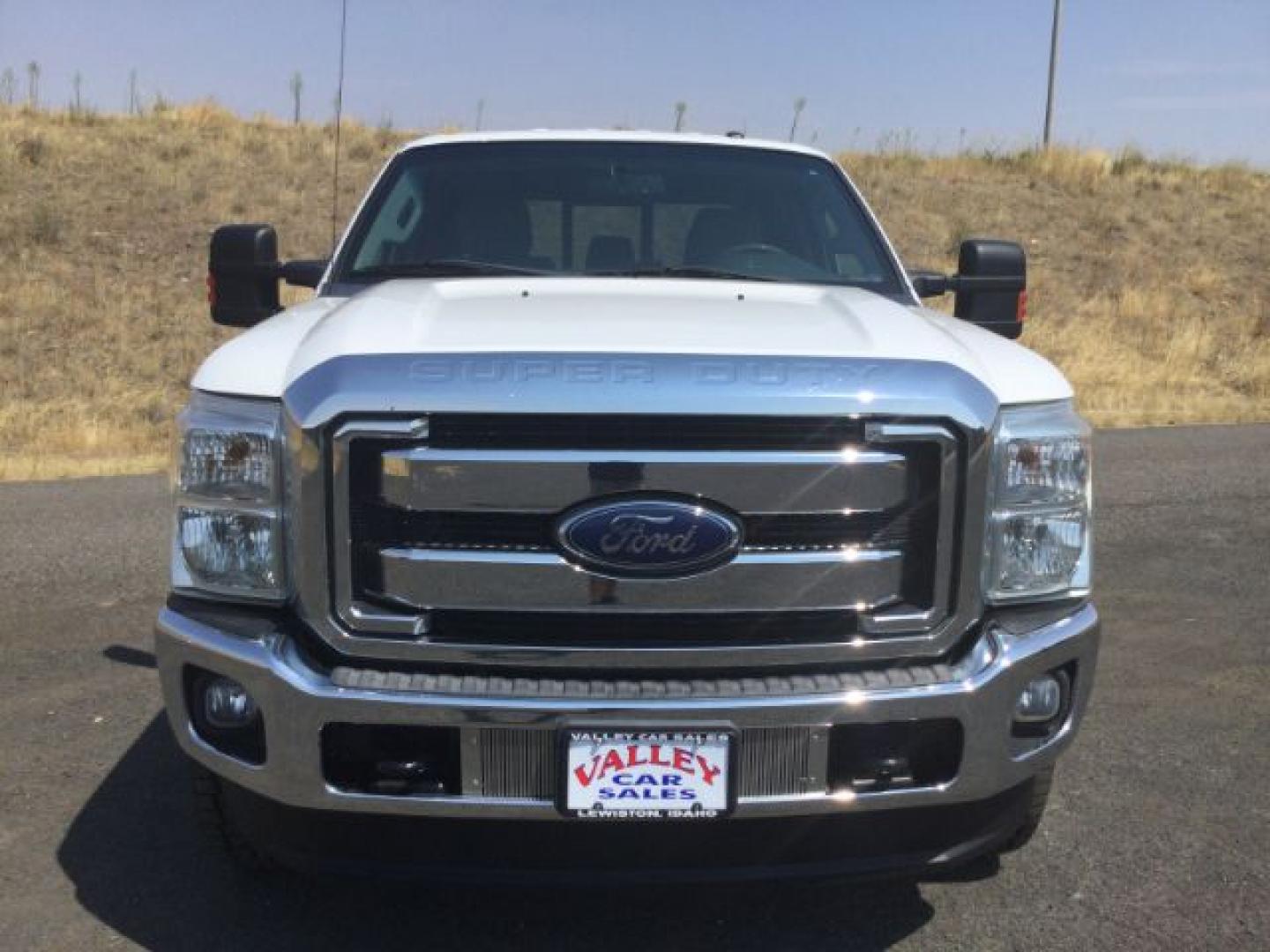 2015 Oxford White /Light Gray Leather Ford F-250 Crew Cab XLT 4x4 FX4 (1FT7W2B69FE) with an 6.2L V8 engine, 6-Speed Automatic transmission, located at 1801 Main Street, Lewiston, 83501, (208) 743-9371, 46.417065, -117.004799- Photo#20