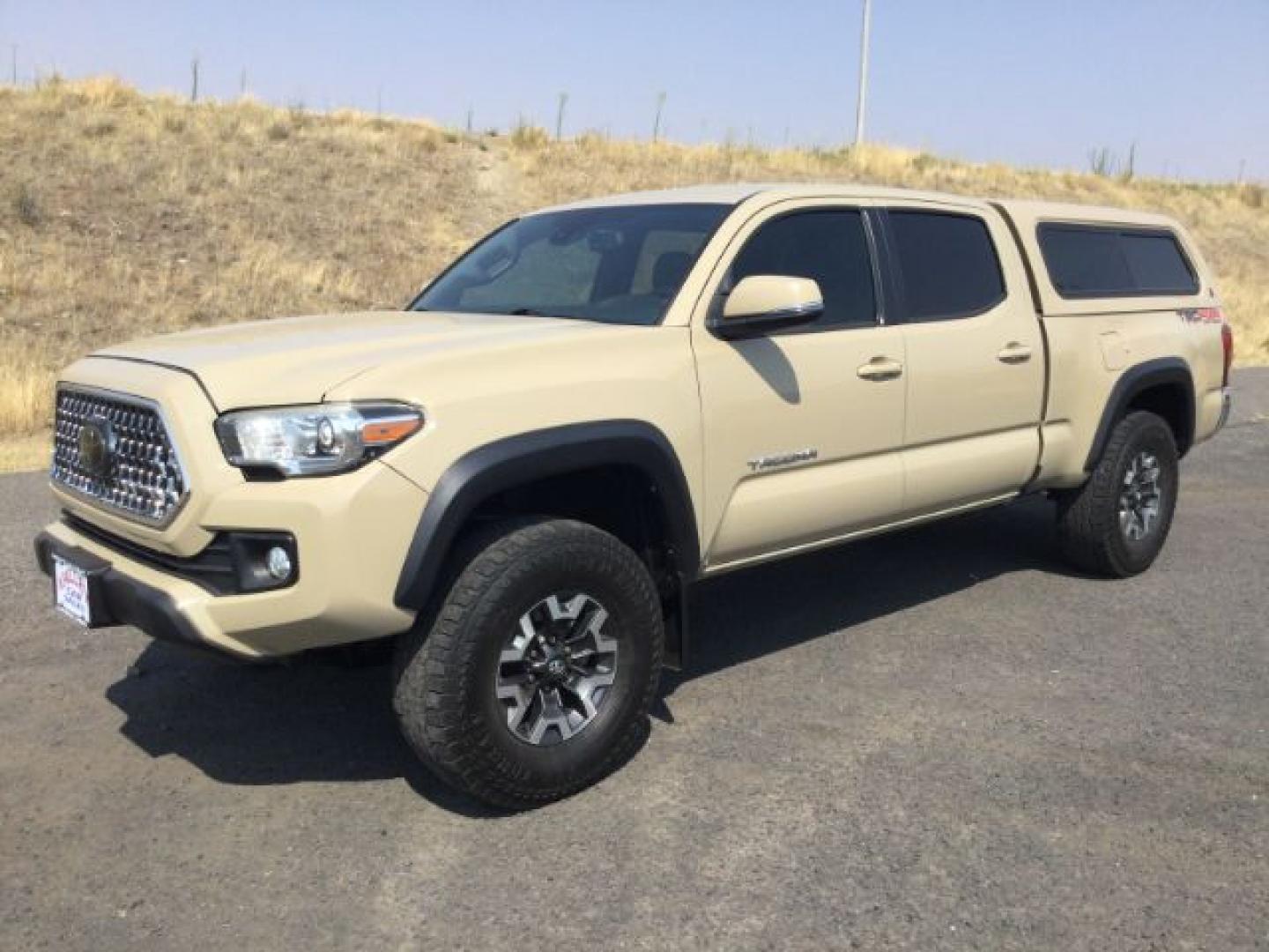 2018 Quicksand /Black/Gray Cloth Toyota Tacoma TRD Off Road (3TMDZ5BN3JM) with an 3.5L V-6 port/direct injection engine, 6-Speed Automatic transmission, located at 1801 Main Street, Lewiston, 83501, (208) 743-9371, 46.417065, -117.004799- Photo#0