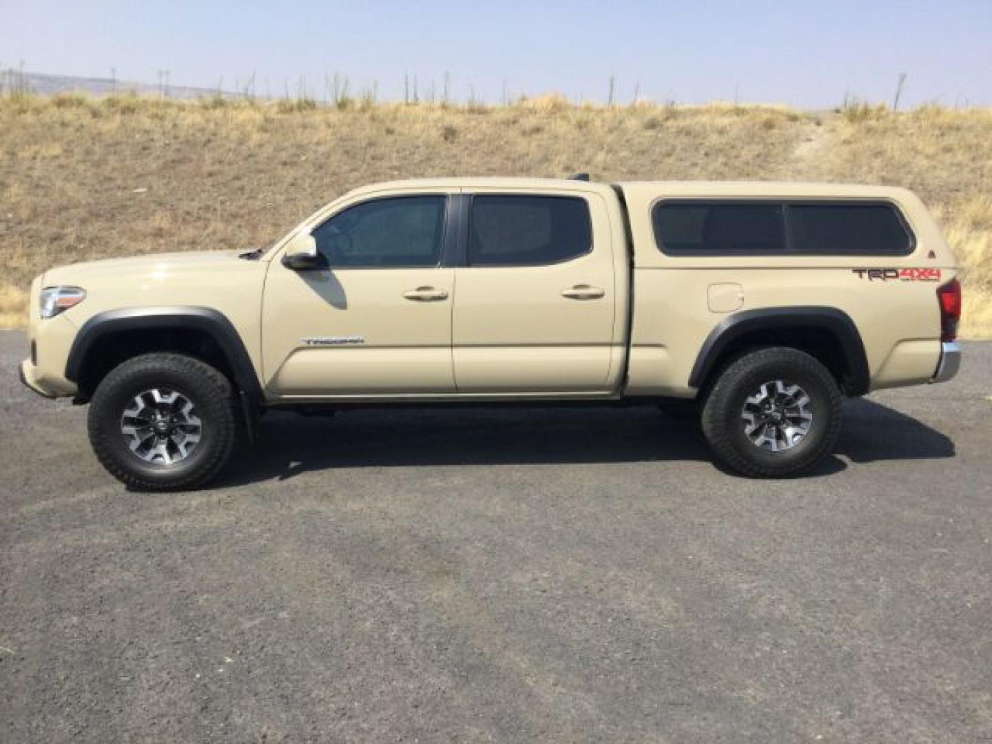 2018 Quicksand /Black/Gray Cloth Toyota Tacoma TRD Off Road (3TMDZ5BN3JM) with an 3.5L V-6 port/direct injection engine, 6-Speed Automatic transmission, located at 1801 Main Street, Lewiston, 83501, (208) 743-9371, 46.417065, -117.004799- Photo#2