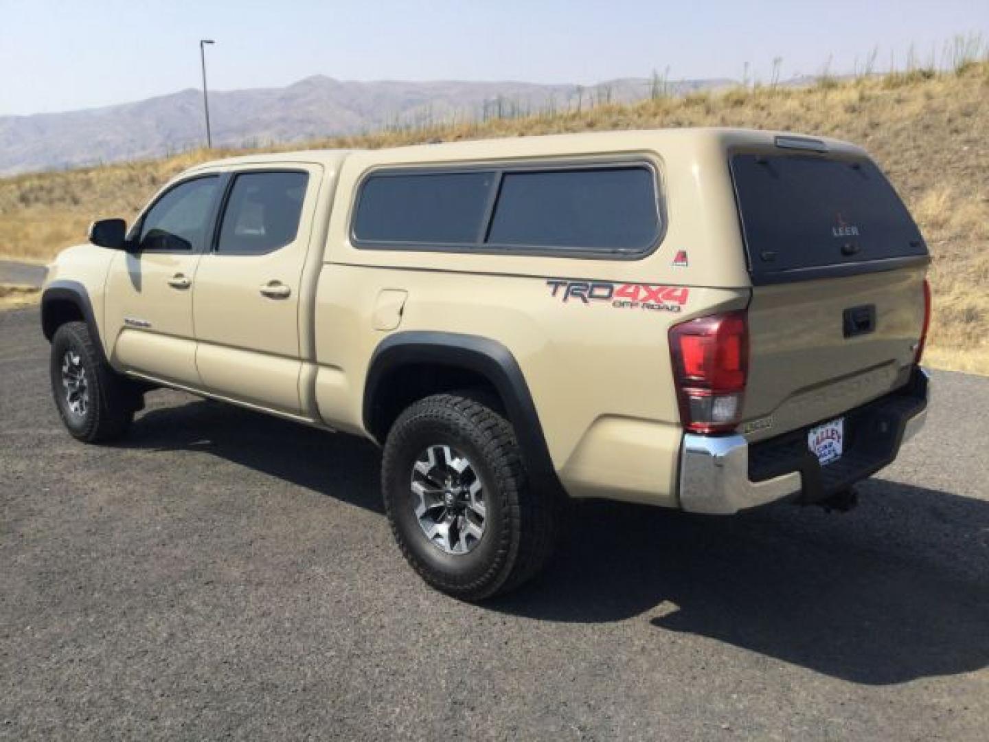 2018 Quicksand /Black/Gray Cloth Toyota Tacoma TRD Off Road (3TMDZ5BN3JM) with an 3.5L V-6 port/direct injection engine, 6-Speed Automatic transmission, located at 1801 Main Street, Lewiston, 83501, (208) 743-9371, 46.417065, -117.004799- Photo#3