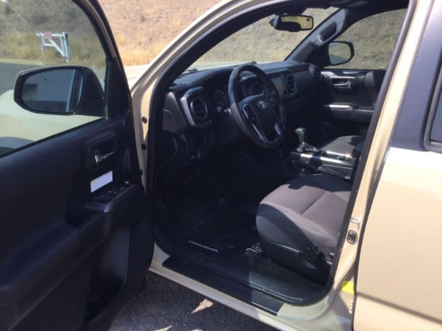 2018 Quicksand /Black/Gray Cloth Toyota Tacoma TRD Off Road (3TMDZ5BN3JM) with an 3.5L V-6 port/direct injection engine, 6-Speed Automatic transmission, located at 1801 Main Street, Lewiston, 83501, (208) 743-9371, 46.417065, -117.004799- Photo#4