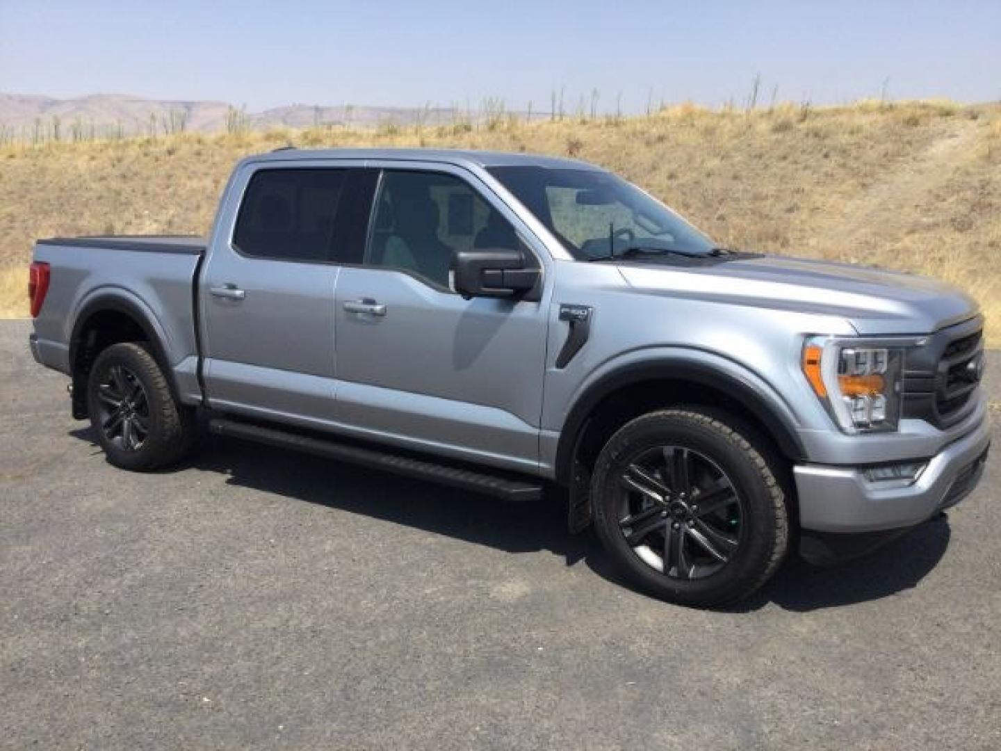 2022 Iconic Silver Metallic /Black w/Medium Dark Slate Ford F-150 XLT (1FTFW1E53NK) with an 5L V-8 port/direct injection engine, 10 speed automatic transmission, located at 1801 Main Street, Lewiston, 83501, (208) 743-9371, 46.417065, -117.004799- Photo#1