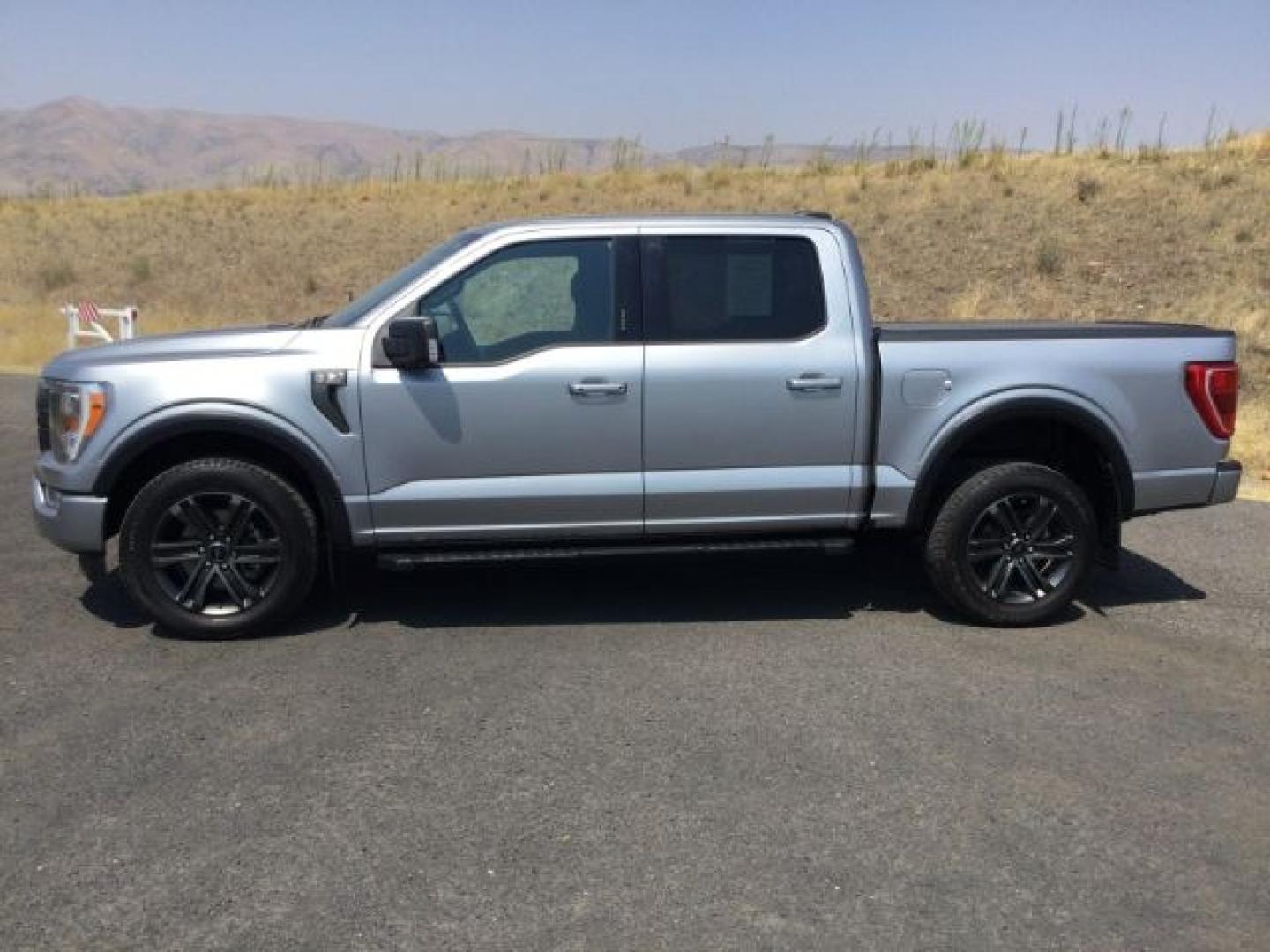 2022 Iconic Silver Metallic /Black w/Medium Dark Slate Ford F-150 XLT (1FTFW1E53NK) with an 5L V-8 port/direct injection engine, 10 speed automatic transmission, located at 1801 Main Street, Lewiston, 83501, (208) 743-9371, 46.417065, -117.004799- Photo#2
