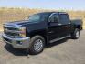 2018 Black /Jet Black Chevrolet Silverado 2500HD Crew Cab LT 4WD (1GC1KUEG9JF) with an Vortec 6L V-8 variable valve control engine, 6-Speed Automatic transmission, located at 1801 Main Street, Lewiston, 83501, (208) 743-9371, 46.417065, -117.004799- Photo#1