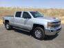 2018 Silver Ice Metallic /Jet Black Chevrolet Silverado 3500HD LT (1GC4KZCY4JF) with an Duramax 6.6L V-8 diesel direct injection engine, 6-Speed Automatic transmission, located at 1801 Main Street, Lewiston, 83501, (208) 743-9371, 46.417065, -117.004799- Photo#0