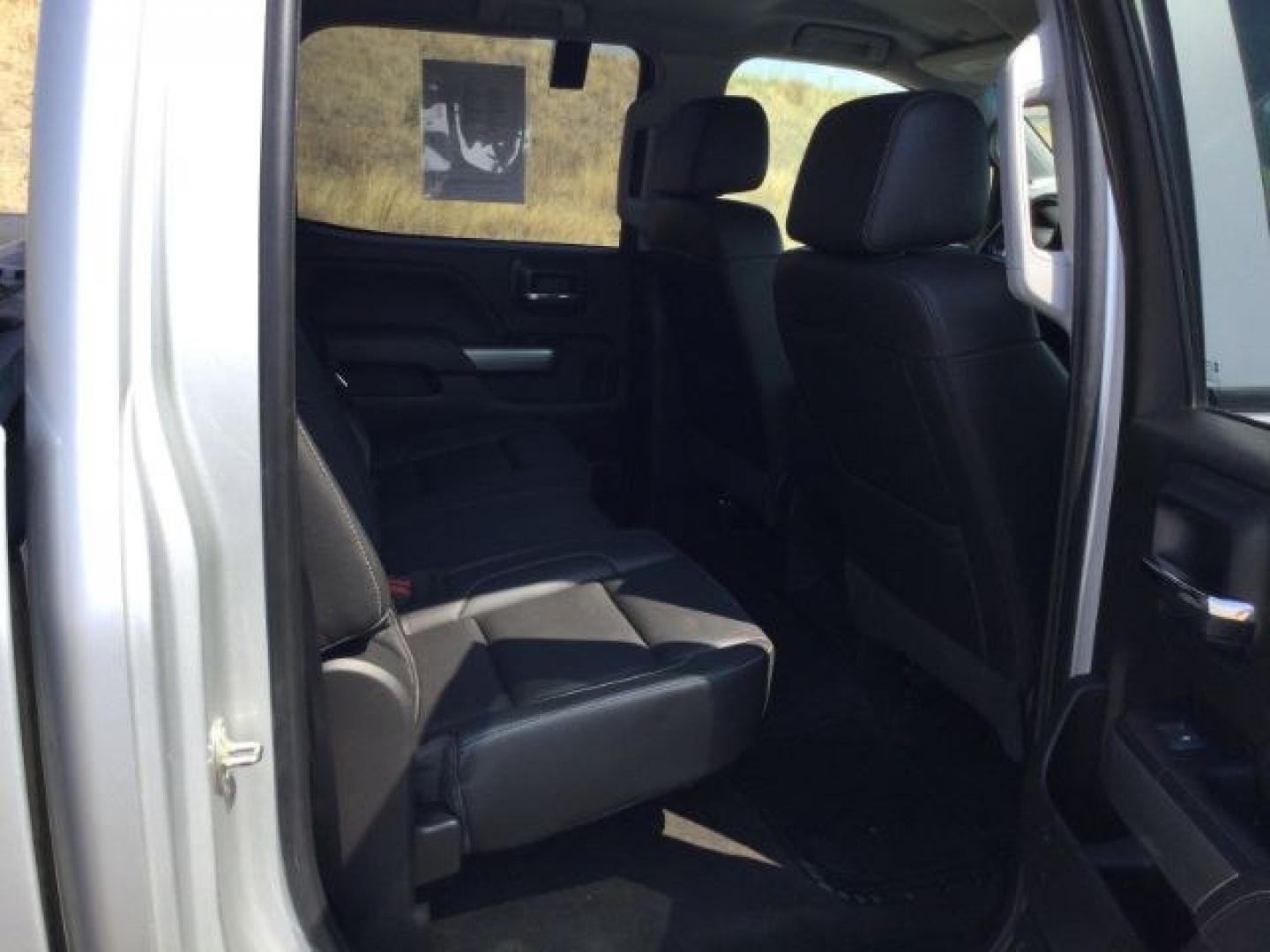 2018 Silver Ice Metallic /Jet Black Chevrolet Silverado 3500HD LT (1GC4KZCY4JF) with an Duramax 6.6L V-8 diesel direct injection engine, 6-Speed Automatic transmission, located at 1801 Main Street, Lewiston, 83501, (208) 743-9371, 46.417065, -117.004799- Photo#16