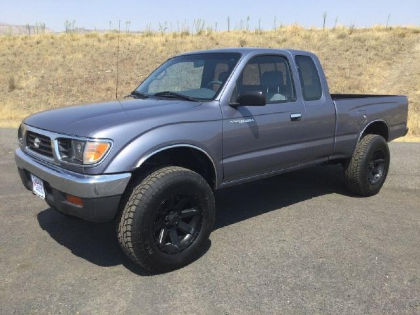 1997 LT BLUE /Gray Toyota Tacoma Base V6 (4TAWN72N6VZ) with an 3.4L V-6 DOHC engine, 5-Speed Manual Transmission transmission, located at 1801 Main Street, Lewiston, 83501, (208) 743-9371, 46.417065, -117.004799- Photo#0