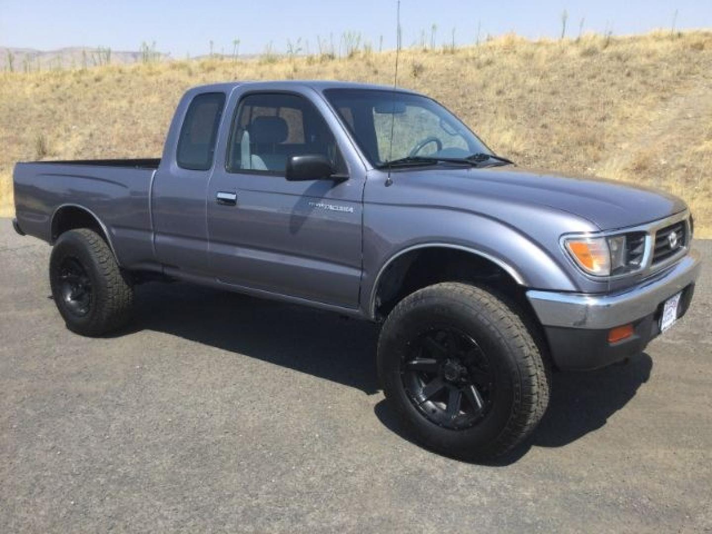 1997 LT BLUE /Gray Toyota Tacoma Base V6 (4TAWN72N6VZ) with an 3.4L V-6 DOHC engine, 5-Speed Manual Transmission transmission, located at 1801 Main Street, Lewiston, 83501, (208) 743-9371, 46.417065, -117.004799- Photo#1