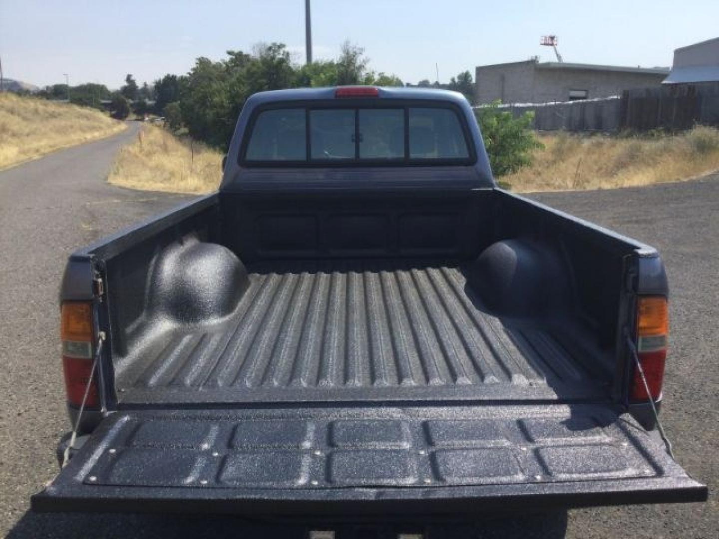 1997 LT BLUE /Gray Toyota Tacoma Base V6 (4TAWN72N6VZ) with an 3.4L V-6 DOHC engine, 5-Speed Manual Transmission transmission, located at 1801 Main Street, Lewiston, 83501, (208) 743-9371, 46.417065, -117.004799- Photo#10