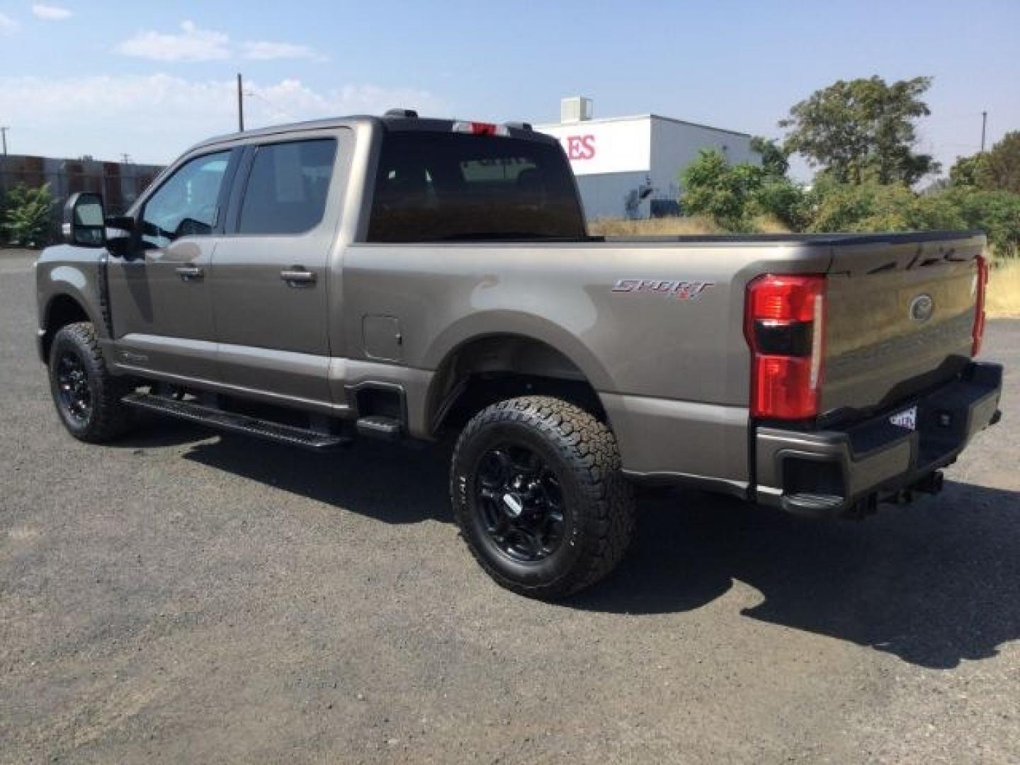 2023 Stone Grey Metallic /Medium Dark Slate Ford F-350 SD Crew Cab XLT 4x4 (1FT8W3BT9PE) with an 6.7L V8 OHV 16V DIESEL engine, 10 speed automatic transmission, located at 1801 Main Street, Lewiston, 83501, (208) 743-9371, 46.417065, -117.004799- Photo#3