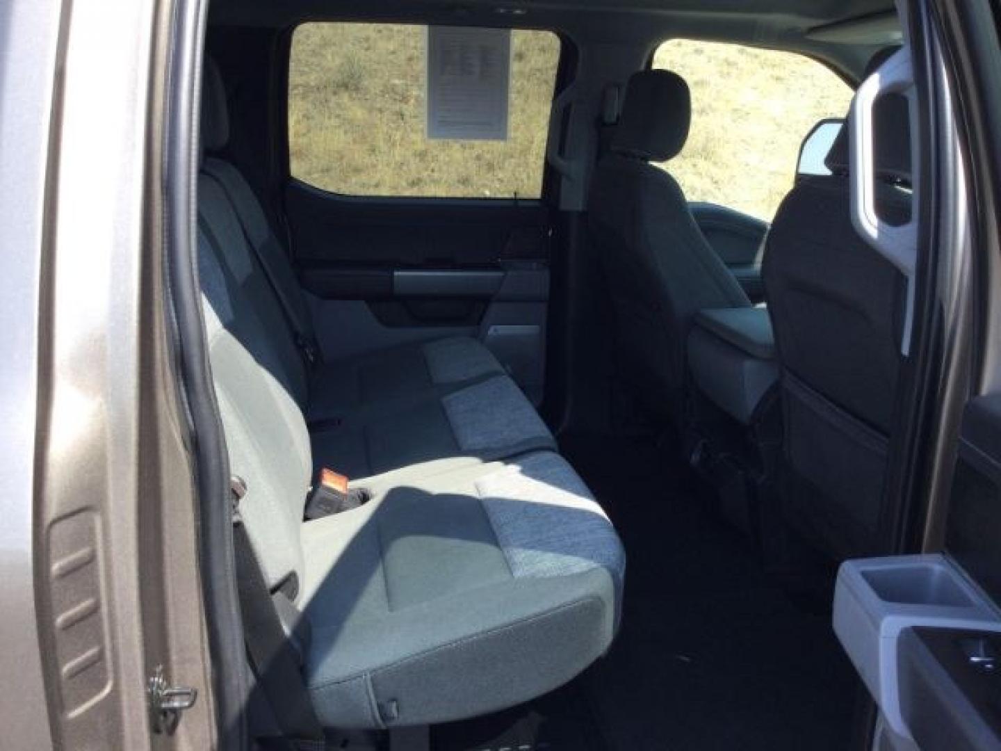 2023 Stone Grey Metallic /Medium Dark Slate Ford F-350 SD Crew Cab XLT 4x4 (1FT8W3BT9PE) with an 6.7L V8 OHV 16V DIESEL engine, 10 speed automatic transmission, located at 1801 Main Street, Lewiston, 83501, (208) 743-9371, 46.417065, -117.004799- Photo#21