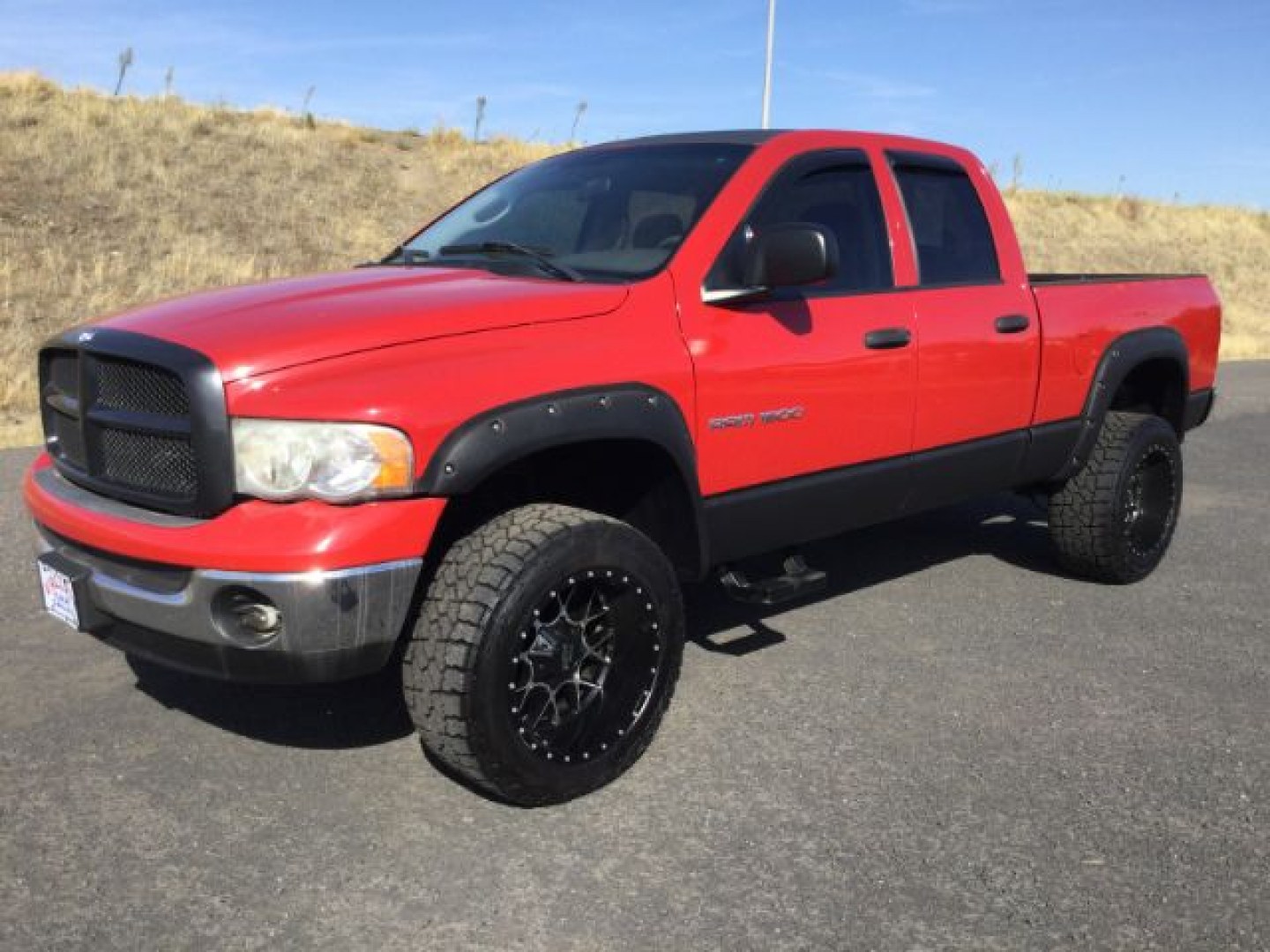 2005 Flame Red Clearcoat /Dark Slate Gray Dodge Ram 1500 SLT Quad Cab (1D7HU18D95S) with an HEMI Magnum 5.7L V-8 regular unleaded engine, 4 speed Automatic transmission, located at 1801 Main Street, Lewiston, 83501, (208) 743-9371, 46.417065, -117.004799- Photo#1