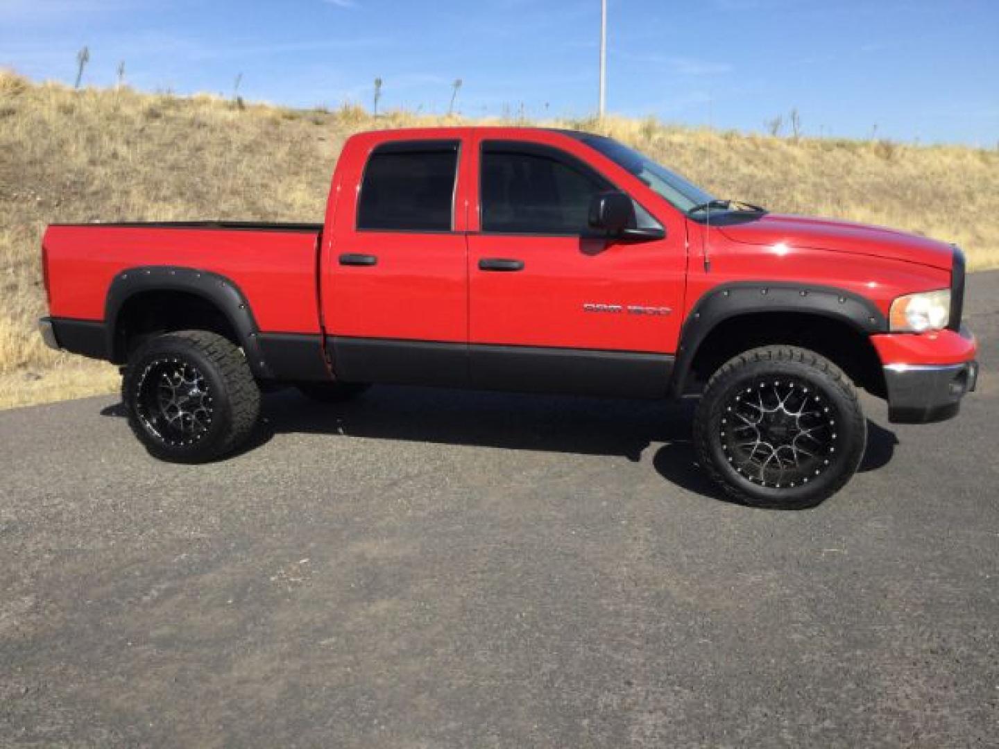2005 Flame Red Clearcoat /Dark Slate Gray Dodge Ram 1500 SLT Quad Cab (1D7HU18D95S) with an HEMI Magnum 5.7L V-8 regular unleaded engine, 4 speed Automatic transmission, located at 1801 Main Street, Lewiston, 83501, (208) 743-9371, 46.417065, -117.004799- Photo#2