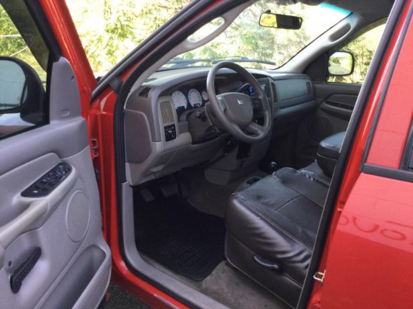 2005 Flame Red Clearcoat /Dark Slate Gray Dodge Ram 1500 SLT Quad Cab (1D7HU18D95S) with an HEMI Magnum 5.7L V-8 regular unleaded engine, 4 speed Automatic transmission, located at 1801 Main Street, Lewiston, 83501, (208) 743-9371, 46.417065, -117.004799- Photo#3