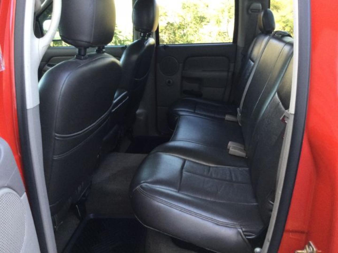 2005 Flame Red Clearcoat /Dark Slate Gray Dodge Ram 1500 SLT Quad Cab (1D7HU18D95S) with an HEMI Magnum 5.7L V-8 regular unleaded engine, 4 speed Automatic transmission, located at 1801 Main Street, Lewiston, 83501, (208) 743-9371, 46.417065, -117.004799- Photo#4
