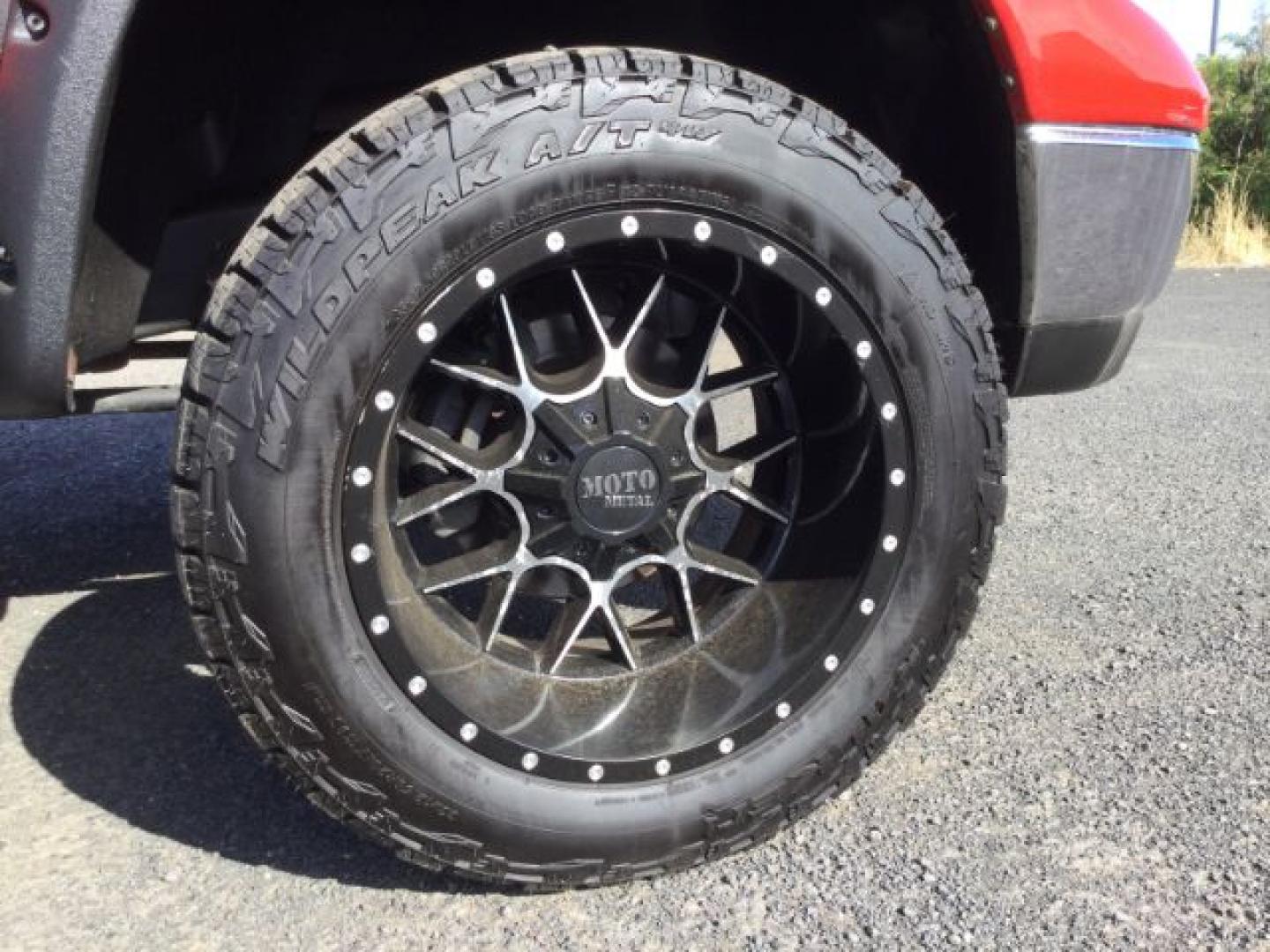 2005 Flame Red Clearcoat /Dark Slate Gray Dodge Ram 1500 SLT Quad Cab (1D7HU18D95S) with an HEMI Magnum 5.7L V-8 regular unleaded engine, 4 speed Automatic transmission, located at 1801 Main Street, Lewiston, 83501, (208) 743-9371, 46.417065, -117.004799- Photo#16
