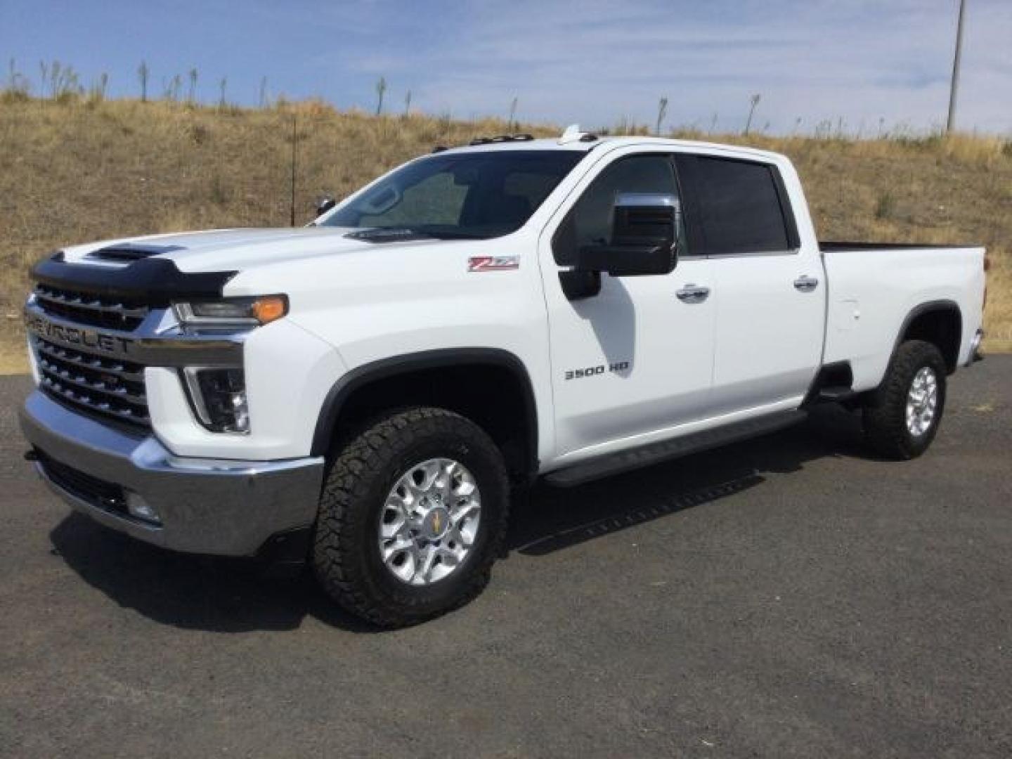2023 Summit White /Jet Black Chevrolet Silverado 3500HD LTZ (1GC4YUEY2PF) with an Duramax 6.6L V-8 direct injection engine, 10-speed automatic transmission, located at 1801 Main Street, Lewiston, 83501, (208) 743-9371, 46.417065, -117.004799- Photo#1