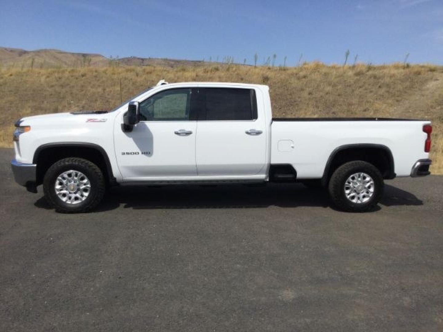2023 Summit White /Jet Black Chevrolet Silverado 3500HD LTZ (1GC4YUEY2PF) with an Duramax 6.6L V-8 direct injection engine, 10-speed automatic transmission, located at 1801 Main Street, Lewiston, 83501, (208) 743-9371, 46.417065, -117.004799- Photo#2