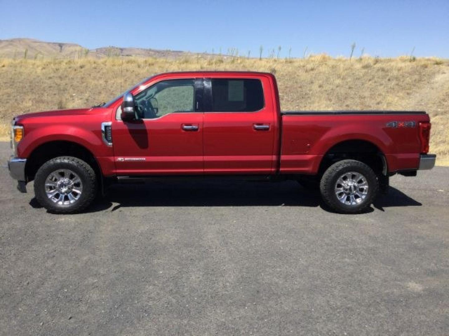 2017 Ruby Red Metallic Tinted Clearcoat /Black Ford F-350 LARIAT (1FT8W3BT7HE) with an Powerstroke 6.7L V-8 diesel direct injection engine, 6-Speed Automatic transmission, located at 1801 Main Street, Lewiston, 83501, (208) 743-9371, 46.417065, -117.004799- Photo#2