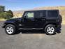2013 Black /Black Jeep Wrangler Unlimited Sahara (1C4BJWEGXDL) with an 3.6L V-6 DOHC engine, 5-Speed Automatic transmission, located at 1801 Main Street, Lewiston, 83501, (208) 743-9371, 46.417065, -117.004799- Photo#1