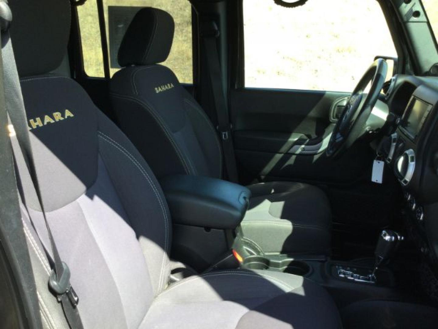 2013 Black /Black Jeep Wrangler Unlimited Sahara (1C4BJWEGXDL) with an 3.6L V-6 DOHC engine, 5-Speed Automatic transmission, located at 1801 Main Street, Lewiston, 83501, (208) 743-9371, 46.417065, -117.004799- Photo#3