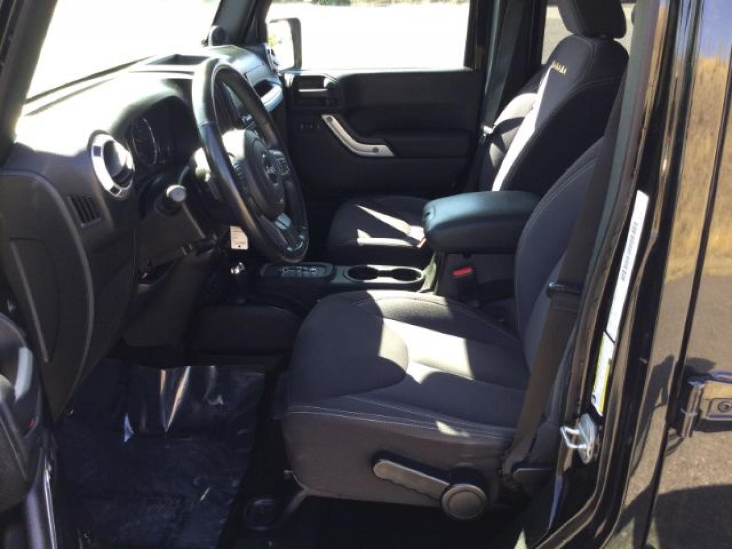2013 Black /Black Jeep Wrangler Unlimited Sahara (1C4BJWEGXDL) with an 3.6L V-6 DOHC engine, 5-Speed Automatic transmission, located at 1801 Main Street, Lewiston, 83501, (208) 743-9371, 46.417065, -117.004799- Photo#4