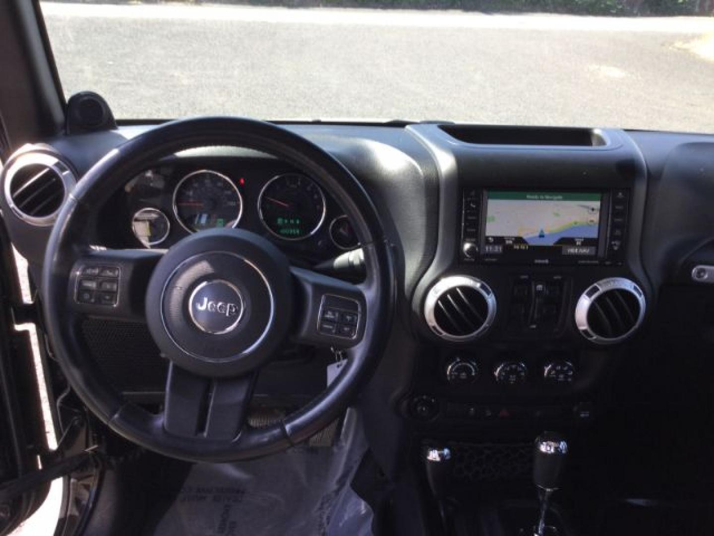 2013 Black /Black Jeep Wrangler Unlimited Sahara (1C4BJWEGXDL) with an 3.6L V-6 DOHC engine, 5-Speed Automatic transmission, located at 1801 Main Street, Lewiston, 83501, (208) 743-9371, 46.417065, -117.004799- Photo#5